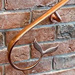 Copper handrail for a swimming pool