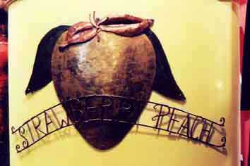 forged steel brass and copper shop sign