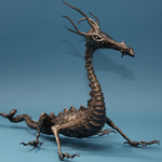 A welded steel dragon sculpture