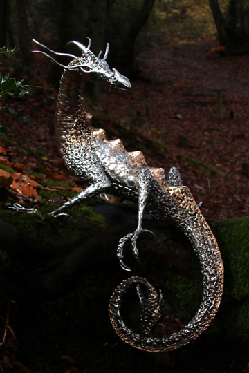 stainless steel and bronze dragon with garnet eyes
