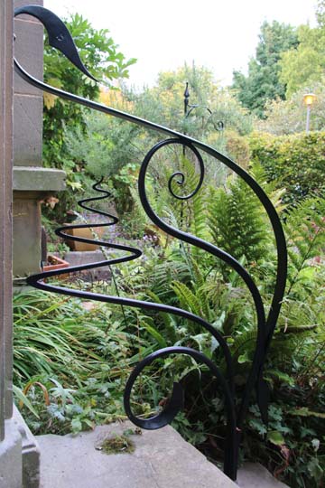 Feature metal handrails outside period property