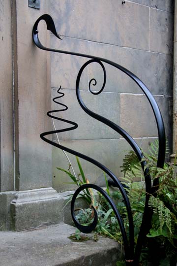 creative artistic metal handrails outside period property