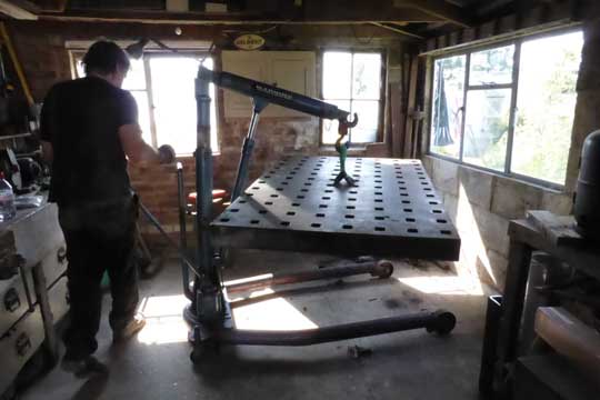 Lifting the platen with an engine crane