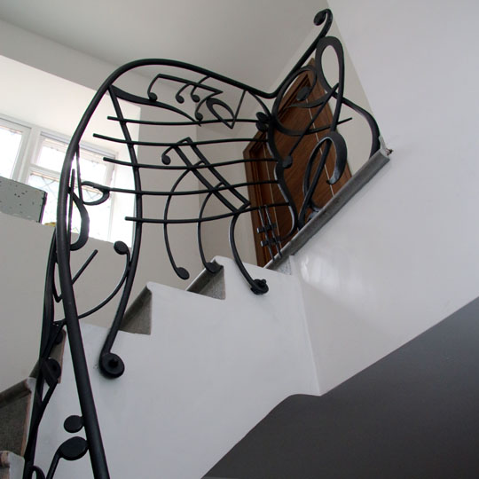  curved stair railings based on musical notes and music