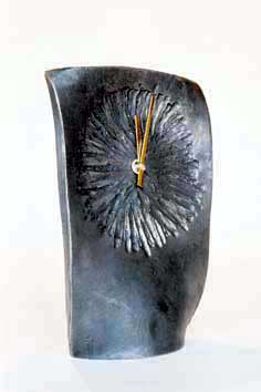 Contemporary forged steel clock