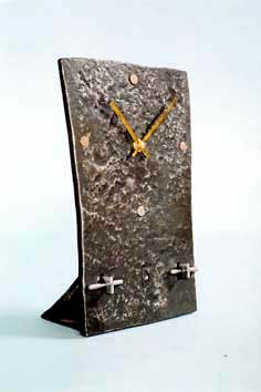 Contemporary forged metal clock