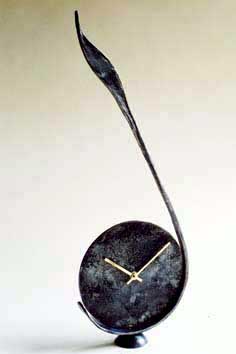 Forged Steel Clock with a burnt steel face