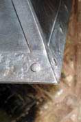 textured steel with a rivet joint