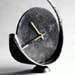 A forged steel clock