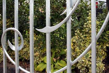 fantasy wrought iron gates; forged steel detailing
