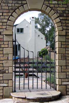 complimentary arch and garden gate