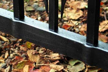 forged steel gates: hot punched holes