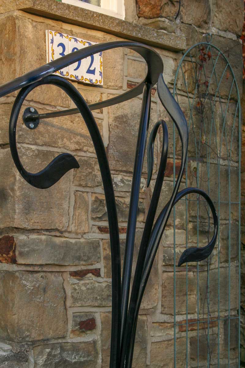 Flowing wrought iron curvy Handrail