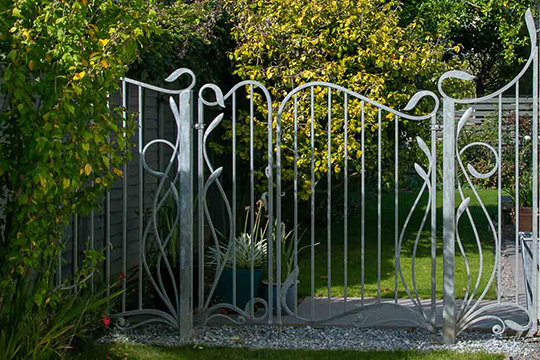 asymmetrical wrought iron Art Nouveau gates