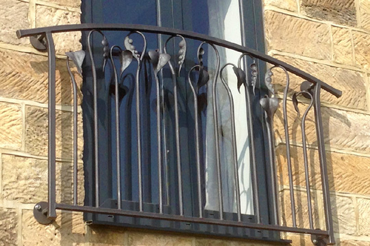 Quirky hand forged Juliet balcony