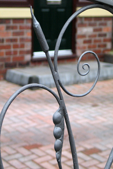 hand forged whimsical garden railings