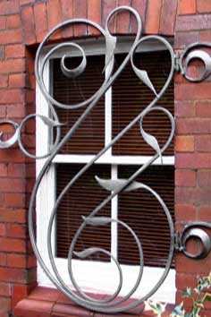 contemporary forged steel security grill