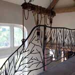 Sculptural tree inspired stair railings