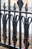 Contemporary Gothic driveway gates with a graphite enhanced paint finish