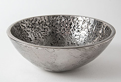Textured and polished stainless steel bowls
