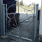 Stylised plant themed garden gate