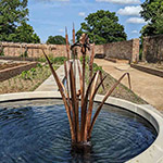 Copper iris and bullrush water feature