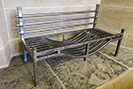 Stainless steel firebasket for a medieval fireplace