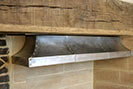 Textured steel fire canopy for a medieval manor