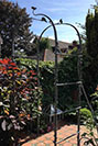 sculptural and ornate rose arch