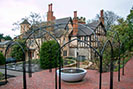 A large and unique steel pergola for a Tudor garden