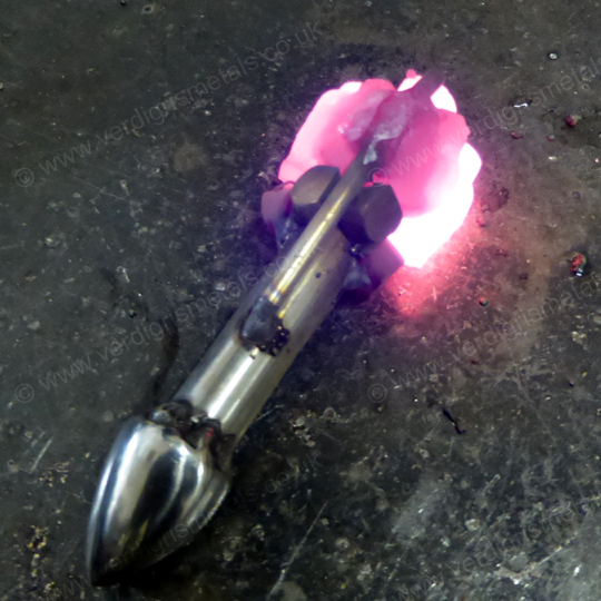 Stainless steel dragon face being made