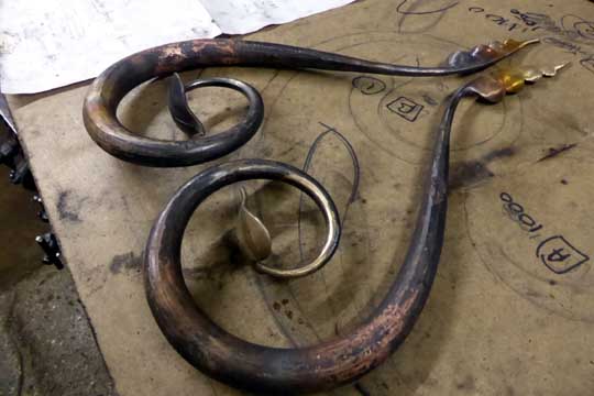 Forged finish bronze door handles