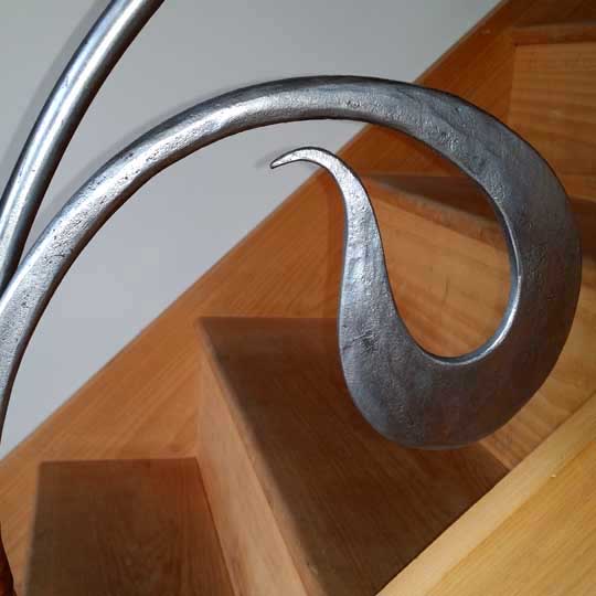 The natural forged texture of the burnished steel
