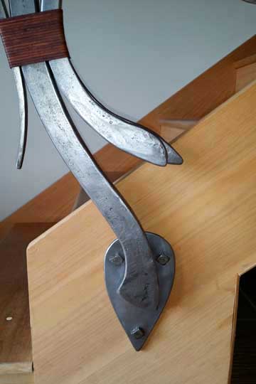 Stair handrail fixings used as a design feature