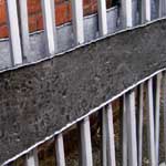 A forged and textured band painted with graphite enhanced paint