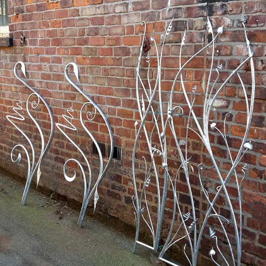 Art Nouveau handrail and sculptural gates