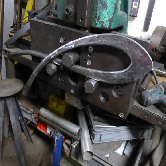 Shaping a forged steel Newel post based on a treble clef