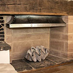 Steel fire canopy for a medieval manor house