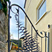 A pedestrian gate designed around stylised ferns