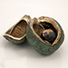 Bronze conker and shell