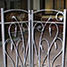 Folding driveway gates