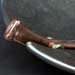 A contemporary bowl with copper and bronze detailing