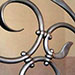 swirling metal stair railings