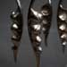 A set of forged bronze door handles