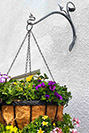 Art Nouveau influenced hanging basket brackets