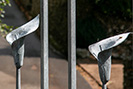 Driveway gates featuring calla lilies and snowdrop lights