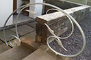 Contemporary curved steel stair handrail