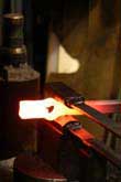 fullering steel under a power hammer