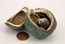 Detailed bronze conker sculptures