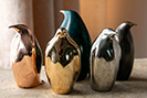 Penguin sculptures cast in different bronze and copper alloy